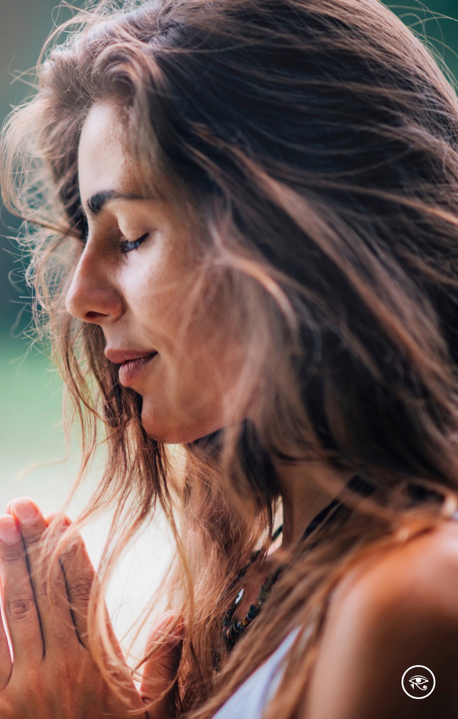 Woman in quiet, focused reflection, contemporary portrait